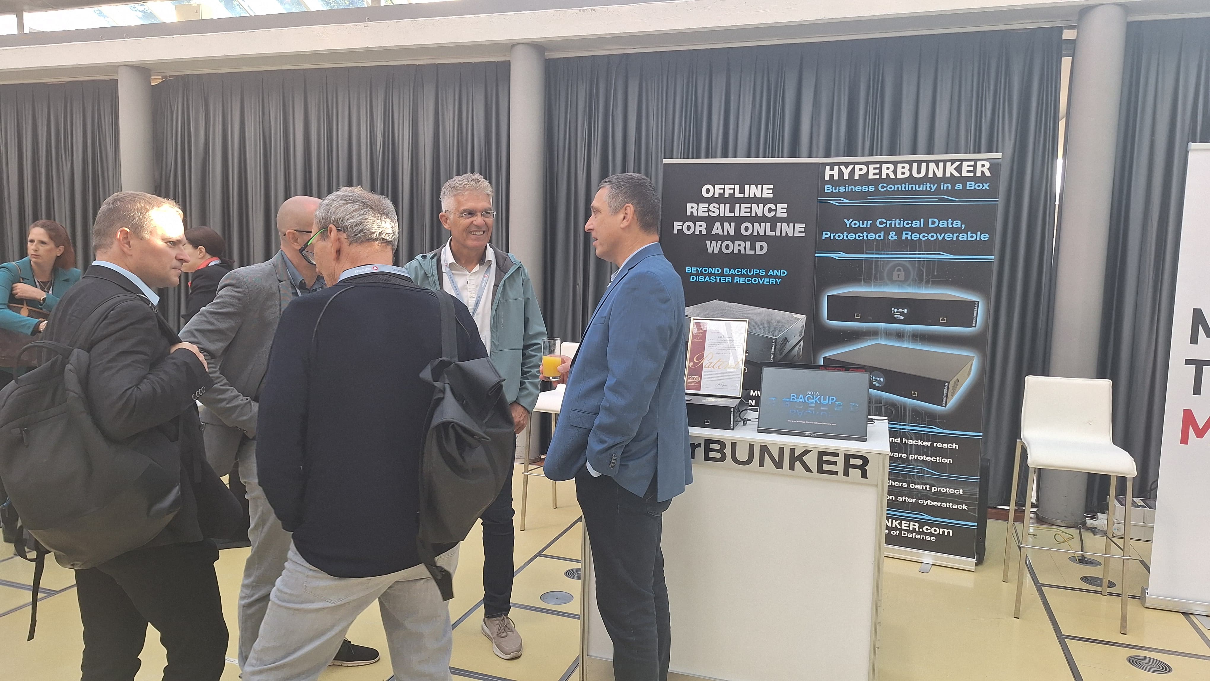 HyperBUNKER team and visitors at the 2026 ICT Security Conference in Linz